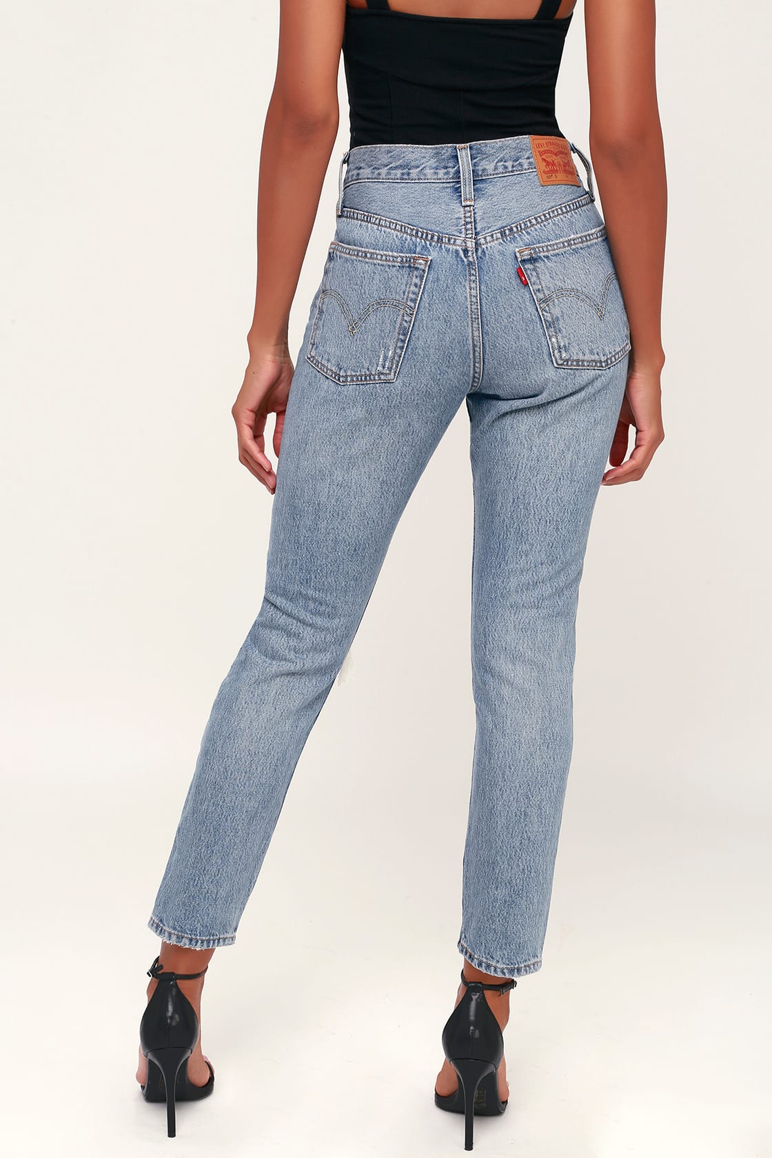 501 skinny distressed 2025 light wash jeans